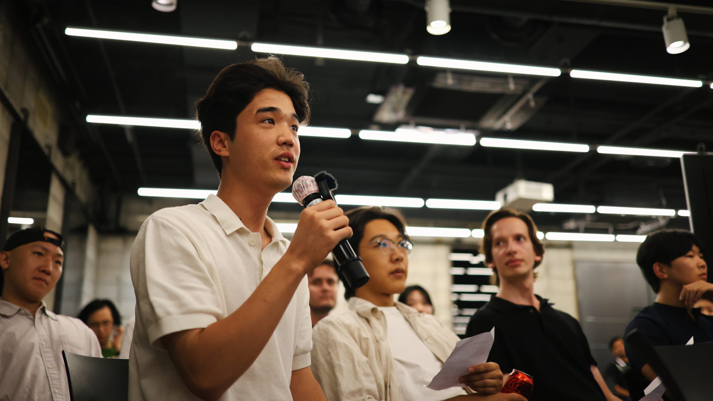 An attendee asking a question
