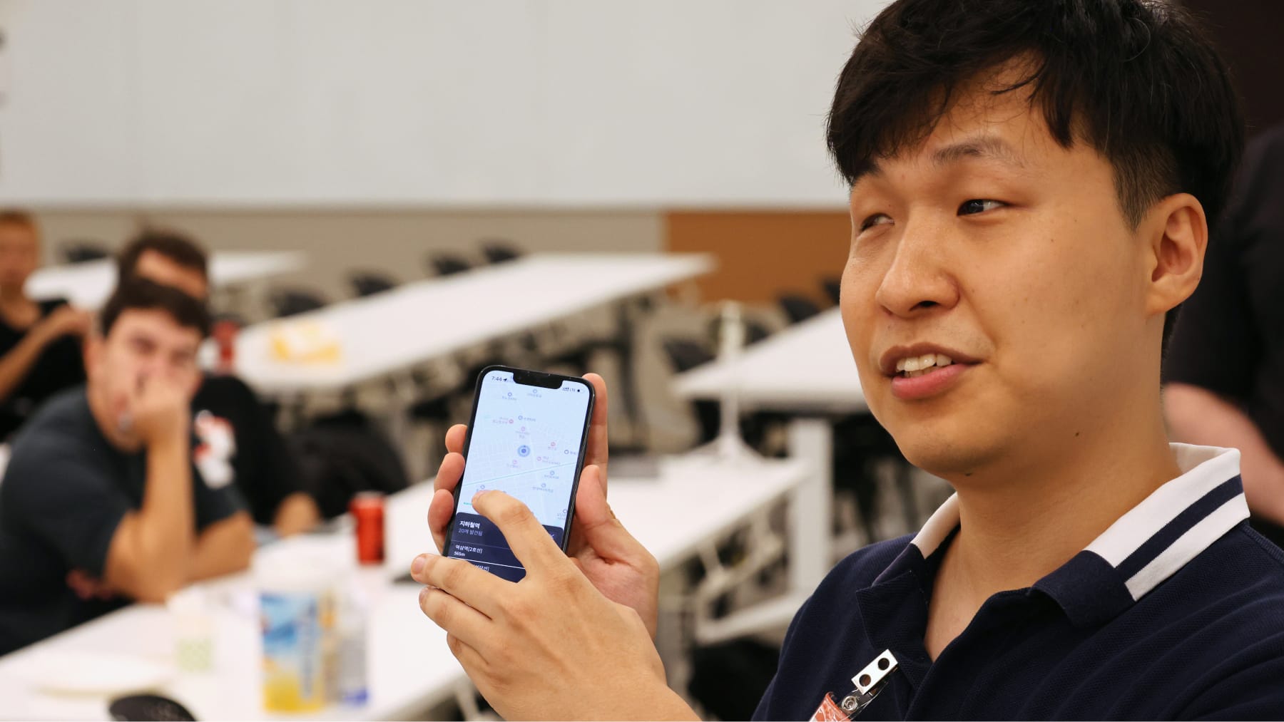Inho Seo showing how he finds places on a map on his phone