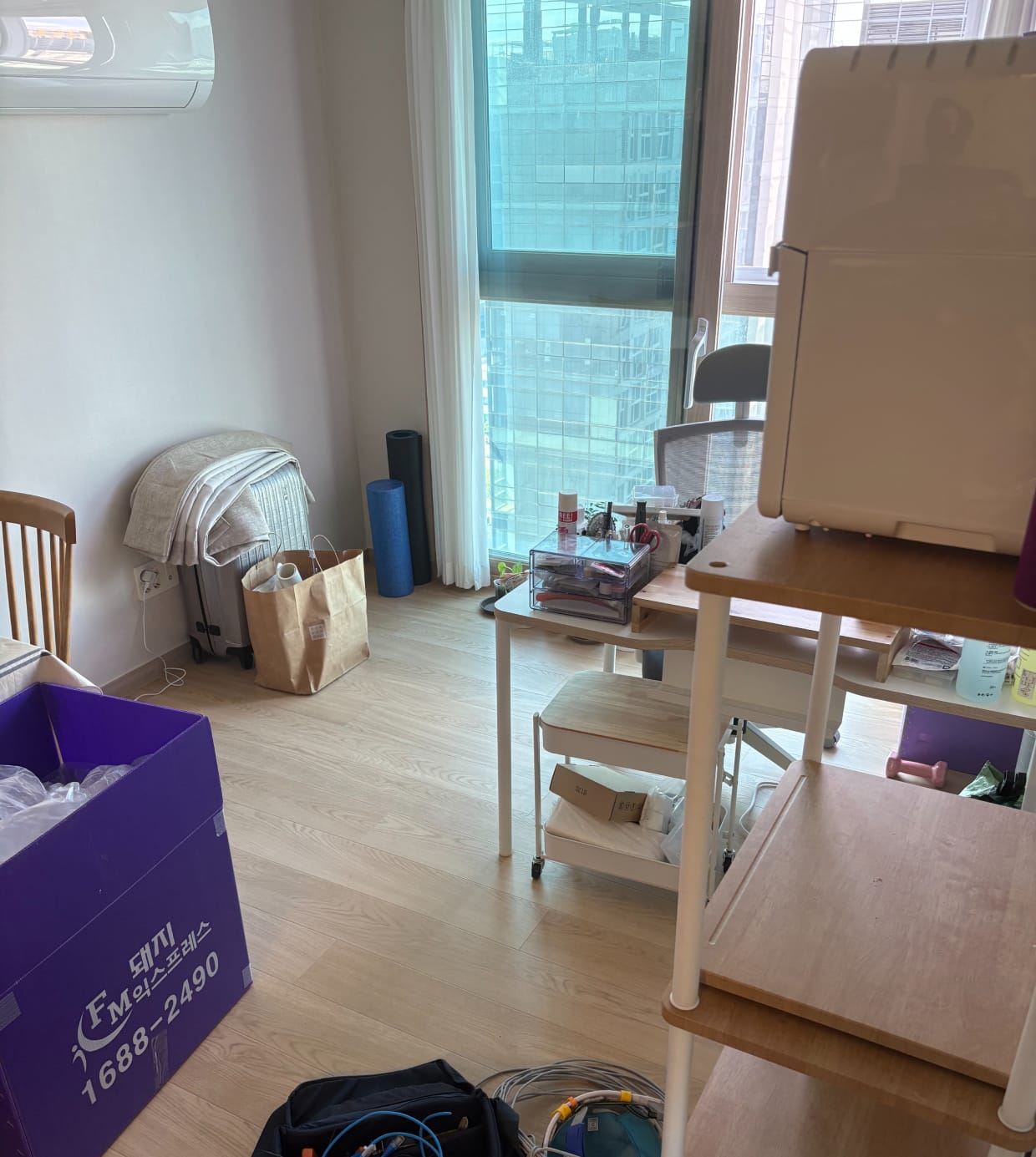 The new apartment slowly being filled and organized
