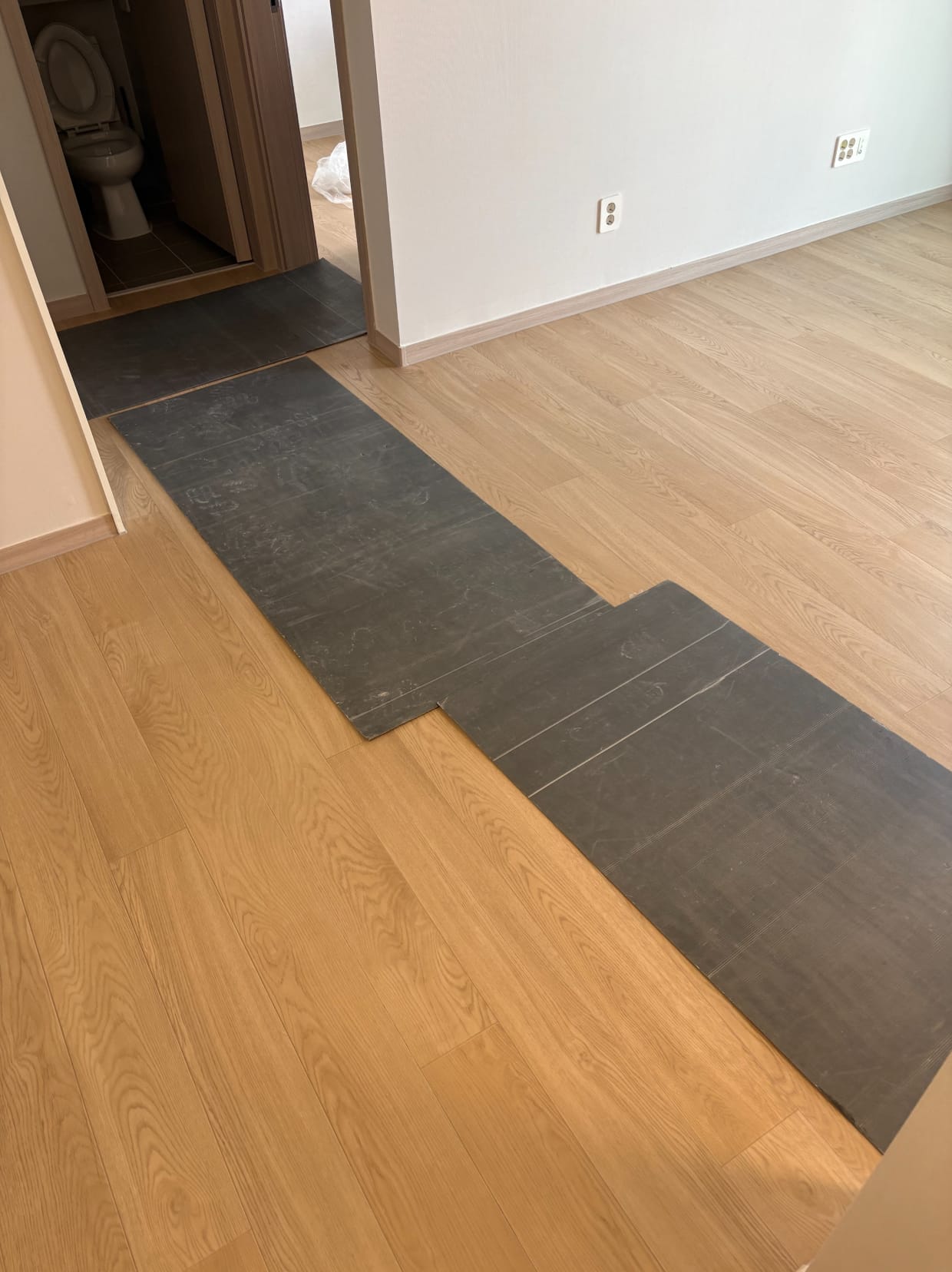 Protective covering placed across the new apartment floor